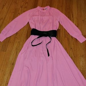 Lady in pink midcalf dress.